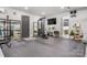 Home gym featuring weight rack, desk and computer setup, and a large mirror at 444 Starnes Circle Dr, Taylorsville, NC 28681
