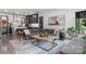 Open concept living room featuring modern decor, stylish furniture, and a view of the gourmet kitchen at 444 Starnes Circle Dr, Taylorsville, NC 28681
