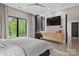 Spacious main bedroom with ensuite vanity, large windows, and ambient lighting at 444 Starnes Circle Dr, Taylorsville, NC 28681
