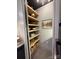 Pantry with wooden shelving and storage baskets to keep kitchen organized at 444 Starnes Circle Dr, Taylorsville, NC 28681