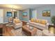 Modern living room with neutral furniture, hardwood floors and modern decor at 4609 Coronado Dr, Charlotte, NC 28212