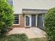 Cozy patio area with a fenced gate, perfect for relaxing outdoors at 4609 Coronado Dr, Charlotte, NC 28212