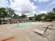 Community pool area with lounge chairs for relaxation at 4609 Coronado Dr, Charlotte, NC 28212