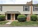 Inviting exterior of a charming home featuring a well-maintained lawn and classic siding at 4609 Coronado Dr # N, Charlotte, NC 28212