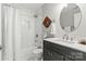 Modern bathroom with sleek fixtures, stylish vanity, and a shower-tub combination at 611 Olmsted Park Pl # C, Charlotte, NC 28203