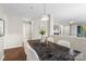 Cozy dining area with stylish table decor, modern lighting, and an open layout at 611 Olmsted Park Pl # C, Charlotte, NC 28203