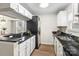 Functional kitchen with granite counters, stainless steel appliances, and modern cabinetry at 611 Olmsted Park Pl # C, Charlotte, NC 28203