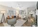 Bright living room with hardwood floors, stylish furnishings, and open floor plan at 611 Olmsted Park Pl # C, Charlotte, NC 28203