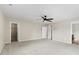 Large bedroom featuring a ceiling fan and doors to a closet and bathroom at 614 Oldham Ln, Rock Hill, SC 29732