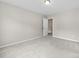 Inviting bedroom featuring carpet flooring, fresh paint and a doorway to closet at 614 Oldham Ln, Rock Hill, SC 29732