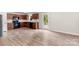 Modern kitchen with wood cabinets, black appliances, and hardwood floors at 614 Oldham Ln, Rock Hill, SC 29732
