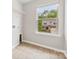 Bright laundry room with views of front yard through a large window at 614 Oldham Ln, Rock Hill, SC 29732