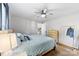 Comfortable bedroom with a ceiling fan and light blue bedding at 619 Archibald Rd, Concord, NC 28025