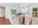 Relaxing living space boasting a stylish sectional sofa, chic decor, and seamless flow to outdoors at 619 Archibald Rd, Concord, NC 28025