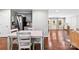 Open floorplan with kitchen, dining area, and living area featuring hardwood floors and modern finishes at 619 Archibald Rd, Concord, NC 28025