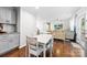 Spacious, open living area with hardwood floors, shiplap accent wall and lots of natural light at 619 Archibald Rd, Concord, NC 28025