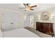 Bedroom with neutral walls, carpet, ceiling fan, and furniture at 7923 Mountain Shore Dr, Sherrills Ford, NC 28673