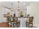 Stylish kitchen with barstool seating, modern appliances, and plenty of countertop space at 7923 Mountain Shore Dr, Sherrills Ford, NC 28673