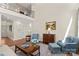 Comfortable living room featuring a balcony, stylish furnishings, and plenty of natural light at 7923 Mountain Shore Dr, Sherrills Ford, NC 28673