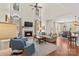 Open concept living area with a fireplace, a dining area, and seamless flow for modern living at 7923 Mountain Shore Dr, Sherrills Ford, NC 28673