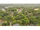 An aerial shot shows the layout of the property with tree-lined property lines highlighted in yellow at 8368 Fairfield Forest Rd, Denver, NC 28037