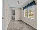 Bright dining room features large windows, light walls, and access to the laundry room at 8368 Fairfield Forest Rd, Denver, NC 28037