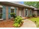 Up close picture of a brick home, front door, walkway and landscaping at 8368 Fairfield Forest Rd, Denver, NC 28037