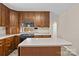 Well-lit kitchen featuring ample cabinet space, modern appliances, and center island at 8368 Fairfield Forest Rd, Denver, NC 28037