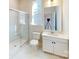 Bathroom featuring glass-enclosed shower, white vanity, and large mirror for a bright and modern feel at 9612 Pointer Rd # 59, Huntersville, NC 28078