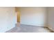 Bedroom with white walls, carpet flooring and an ensuite bathroom provides a peaceful retreat at 9612 Pointer Rd # 59, Huntersville, NC 28078