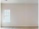 A spacious bedroom with natural light, plush carpeting, and neutral wall color at 9612 Pointer Rd # 59, Huntersville, NC 28078