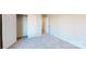 Bedroom with neutral walls, doors to a closet and ensuite, and plush carpeting at 9612 Pointer Rd # 59, Huntersville, NC 28078