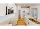 Modern white kitchen featuring stainless steel appliances, marble countertops, and ample cabinet space at 9612 Pointer Rd # 59, Huntersville, NC 28078