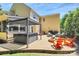 Backyard oasis with a spacious patio, hot tub, fire pit, and ample seating, perfect for outdoor gatherings at 9930 Karras Commons Way, Matthews, NC 28105