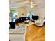 Cozy living room features vaulted ceilings, hardwood floors, and comfortable seating arrangement at 101 Keswick Ln, Mooresville, NC 28117