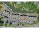 Aerial view of waterfront condos with ample parking, manicured landscaping, and easy lake access at 104 Pier 33 Dr # 312, Mooresville, NC 28117