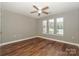 Light-filled bedroom featuring beautiful floors and a ceiling fan at 104 Pier 33 Dr # 312, Mooresville, NC 28117