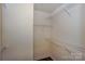 Walk-in closet providing ample storage with installed wire shelving at 104 Pier 33 Dr # 312, Mooresville, NC 28117