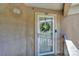 Inviting front door with a decorative wreath and a clear view through the glass at 104 Pier 33 Dr # 312, Mooresville, NC 28117