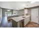 Modern kitchen with stainless steel dishwasher, white cabinets, and open floor plan at 104 Pier 33 Dr # 312, Mooresville, NC 28117