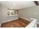A view of the open floor plan showcasing the kitchen with stainless appliances and a breakfast bar at 104 Pier 33 Dr # 312, Mooresville, NC 28117