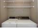 Convenient laundry room area equipped with a washer and dryer at 104 Pier 33 Dr # 312, Mooresville, NC 28117