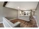 Open-concept living space, featuring a modern kitchen and ample room for entertaining at 104 Pier 33 Dr # 312, Mooresville, NC 28117