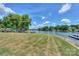 Picturesque waterfront view with boats, docks, and lush green lawn for serene outdoor enjoyment at 104 Pier 33 Dr # 312, Mooresville, NC 28117