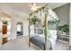 Airy bedroom showcasing a bed frame adorned with leafy garlands and stylish decor at 117 Mills Ln, Fort Mill, SC 29708