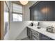 Cozy butler's pantry with blue cabinets, wine fridge, and a convenient countertop at 117 Mills Ln, Fort Mill, SC 29708