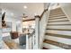 Cozy view into the living room from the staircase, showcasing an open-concept design at 117 Mills Ln, Fort Mill, SC 29708