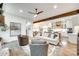 Bright living room with fireplace, open to dining area and kitchen, perfect for entertaining at 117 Mills Ln, Fort Mill, SC 29708