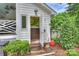 Charming entrance featuring a warm wood floor and accent wall, leading into a bright, inviting space at 12028 Royal Lytham Ct, Charlotte, NC 28277