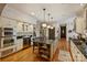 Spacious kitchen with a large island, stainless steel appliances, and hardwood flooring at 12028 Royal Lytham Ct, Charlotte, NC 28277